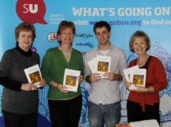 Enjoying  the  craic and circulating the cookbook  at  Queens’  Student  Bazaar are, from left: Moira  Thom  (Diocesan  President),  Alison  Skillen  (Action  &  Outreach  Coordinator),  Ciarnan  Helferty (Student’s  Union  President), and   Liz  Egerton  (Projects  Rep).